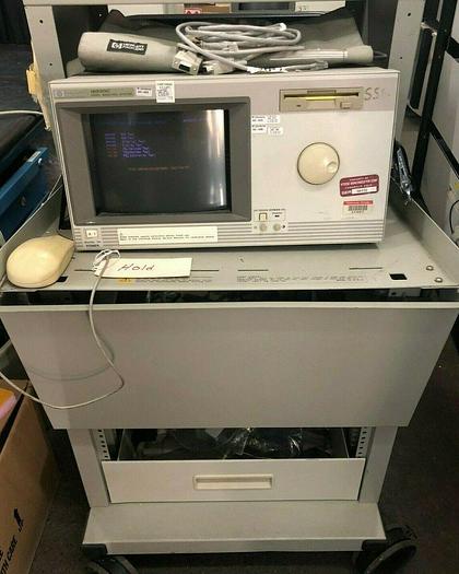 Used HEWLETT PACKARD 16500C LOGIC ANALYSIS SYSTEM 16500-40502 x3, 16555D Analyzer